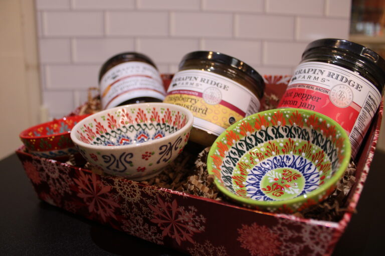 A custom basket full of saucers and jams! The perfect combo.